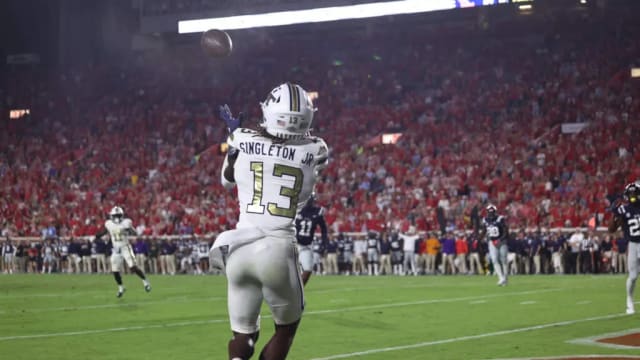 Eric Singleton Jr. catches a pass against Ole Miss